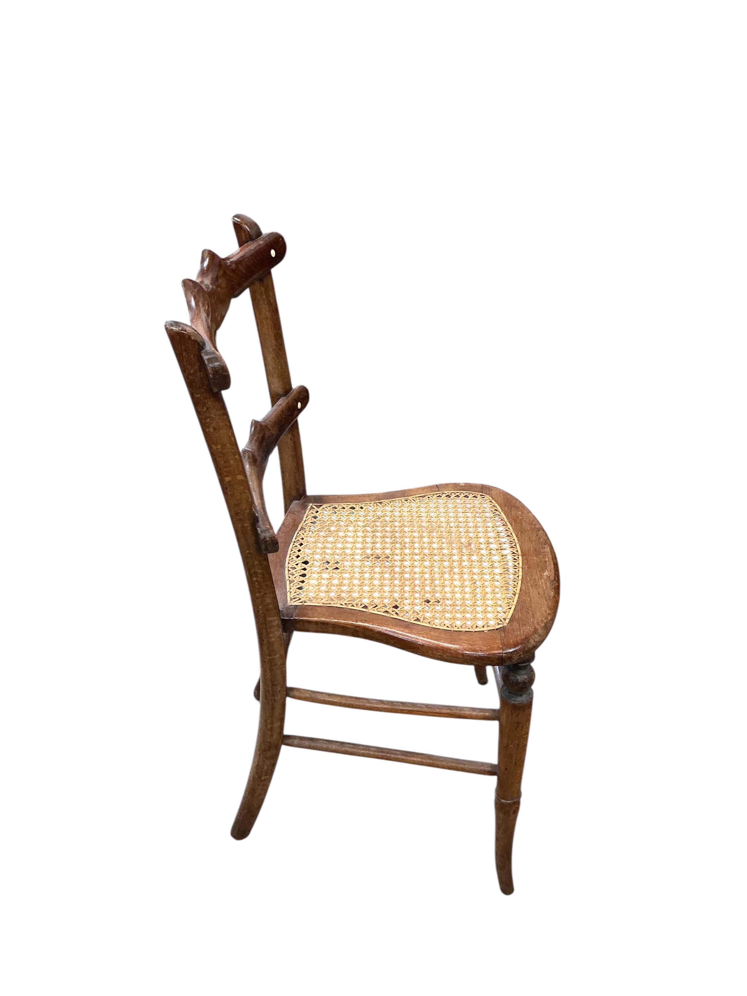 A harlequin set of six 19th century French beech cane seat chairs